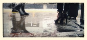 New Brunswick train station, New Jersey - boots and shoes on wet reflective ground before a snow storm