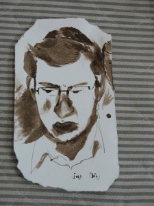 Ink-and-wash portrait of a bearded young man in glasses