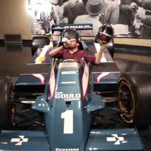 The Gould Charge number 1 Indy car with its driver figure, arms raised