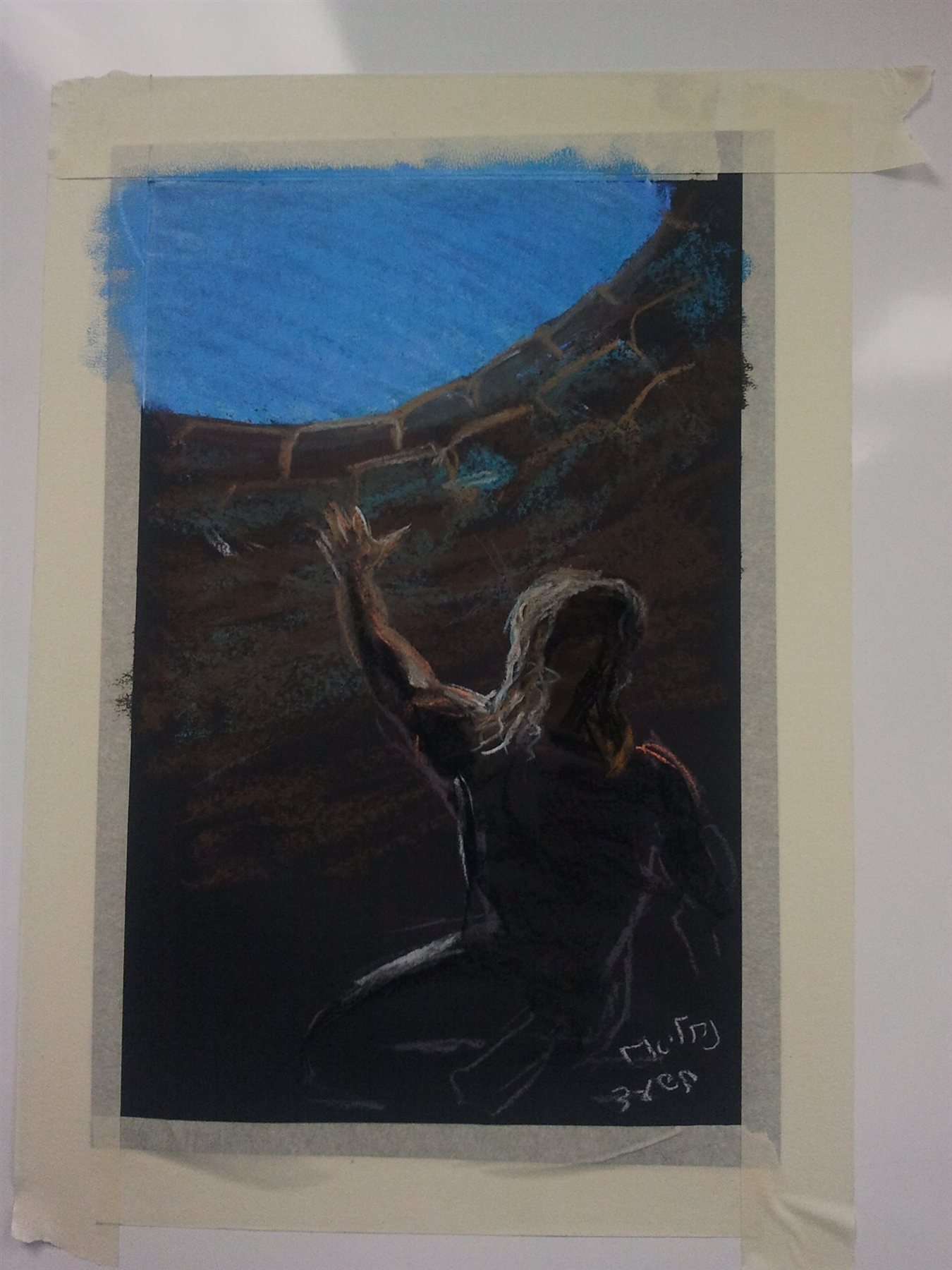 Joseph in the pit, arms raised toward the opening above — pastel drawing