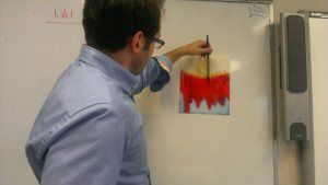 The artist drawing the Nile turning to blood on a whiteboard - photo