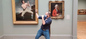 Nachliel Selavan boxing with a work of art at the Met